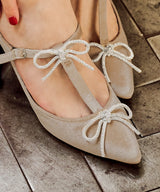 T-strap mules with glitter bow